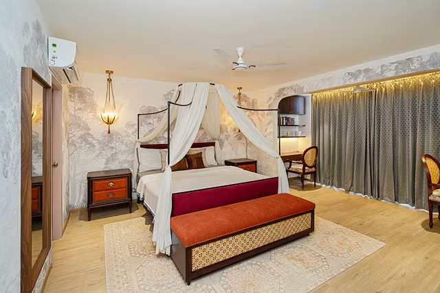 Classic Master Bedroom Design with Four-Poster Canopy Bed and Built-In Study Unit